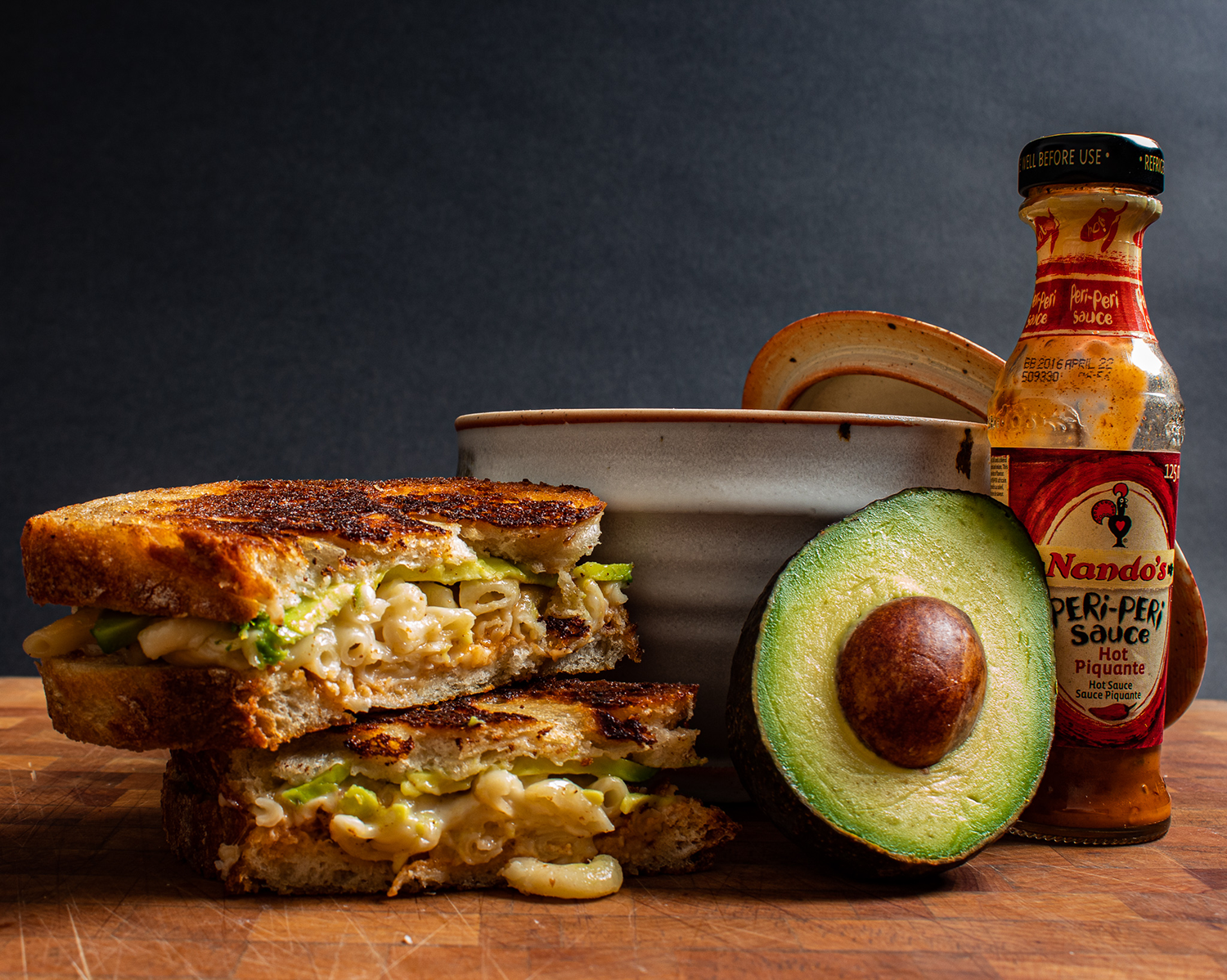 mac and grilled cheese with avocado and peri-peri sauce